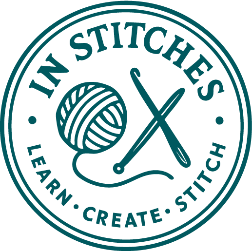 In Stitches logo